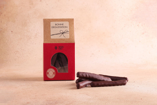 Lamelles d'écorce d'orange confites et enrobées de Chocolat Noir Grand Cru 72% (100g)
